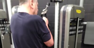 Image shows Peter using gym equipment